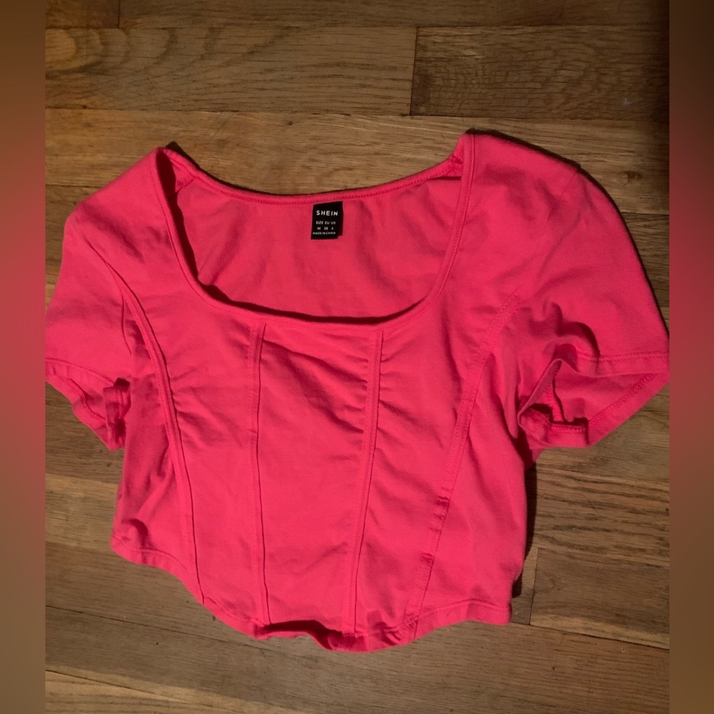 cropped pink shirt